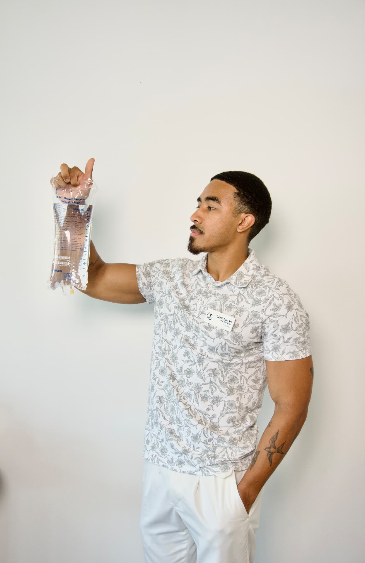 Push Med provider holding an IV therapy bag in Greenville SC